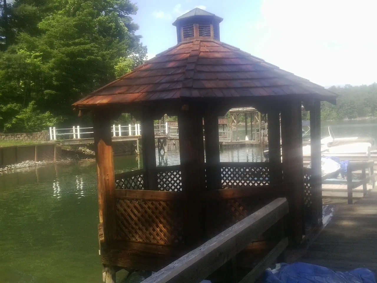 Cedar shake gazebo roof rebuilt on a lake dock in Fairborn